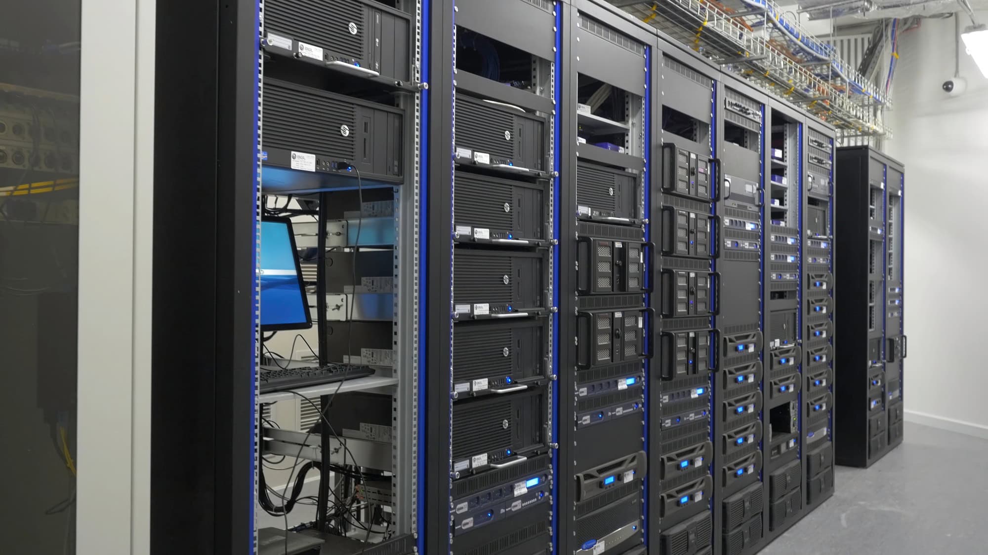 Many powerful servers running in the data center server room. Many servers in a data center. Many